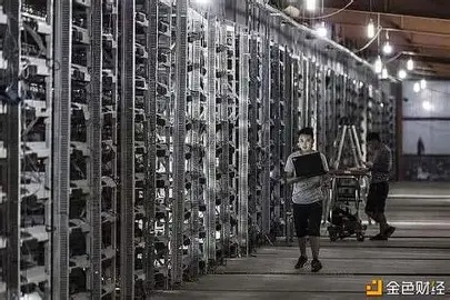 Rows of server racks filled with ASIC miners in a large, climate-controlled mining facility.